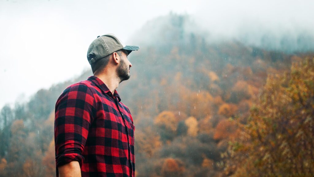 Portrait of Handsome Young Man with Cap and Checkered Shirt in F